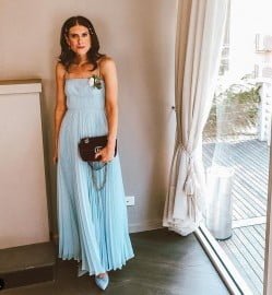 woman dressed in light blue formal dress for wedding