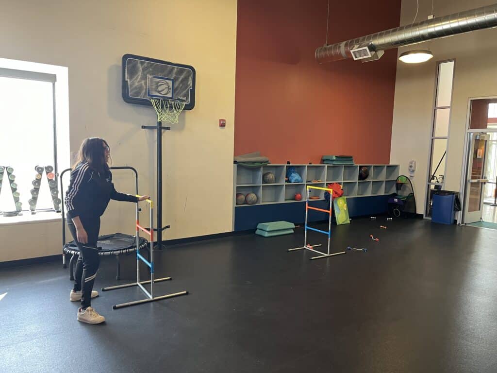 Young woman playing ladder golf